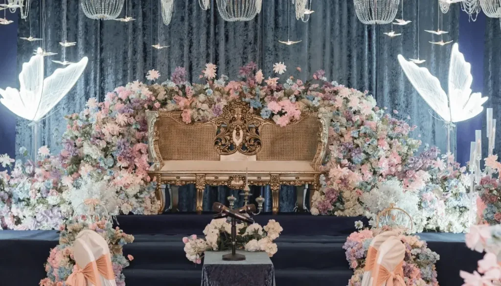 A wedding dais decorated with a celestial or heavenly theme.
