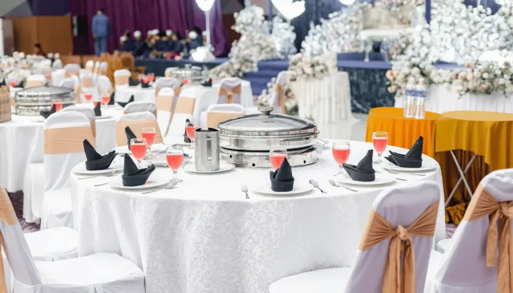 Dining tables for guests in a wedding hall in Putrajaya.